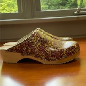 Very unique wooden clogs